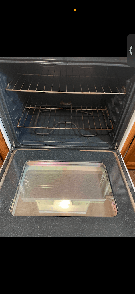 Oven interior after Feather & Steel deep clean, glass and cavity spotless